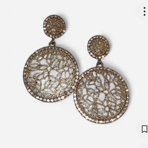 Gold tone floral filigree drop earrings with rhinestone accents